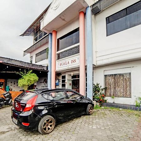 Oyo 90450 Sentra Inn Medan Buitenkant foto