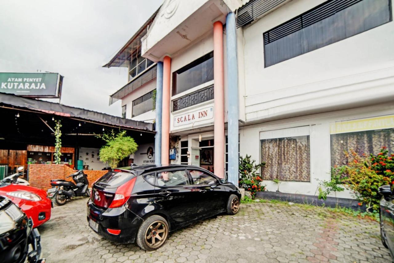 Oyo 90450 Sentra Inn Medan Buitenkant foto