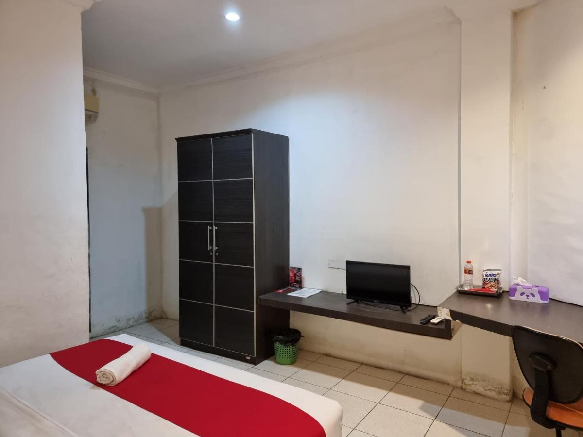 Oyo 90450 Sentra Inn Medan Buitenkant foto